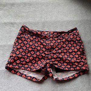 Navy and Orange print shorts